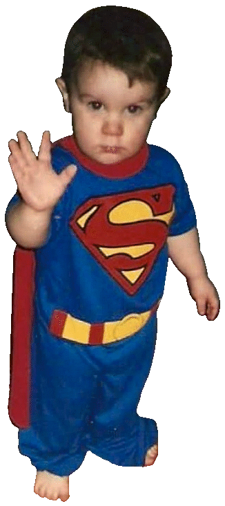 Kirby Simmons as a boy in a superman costume.